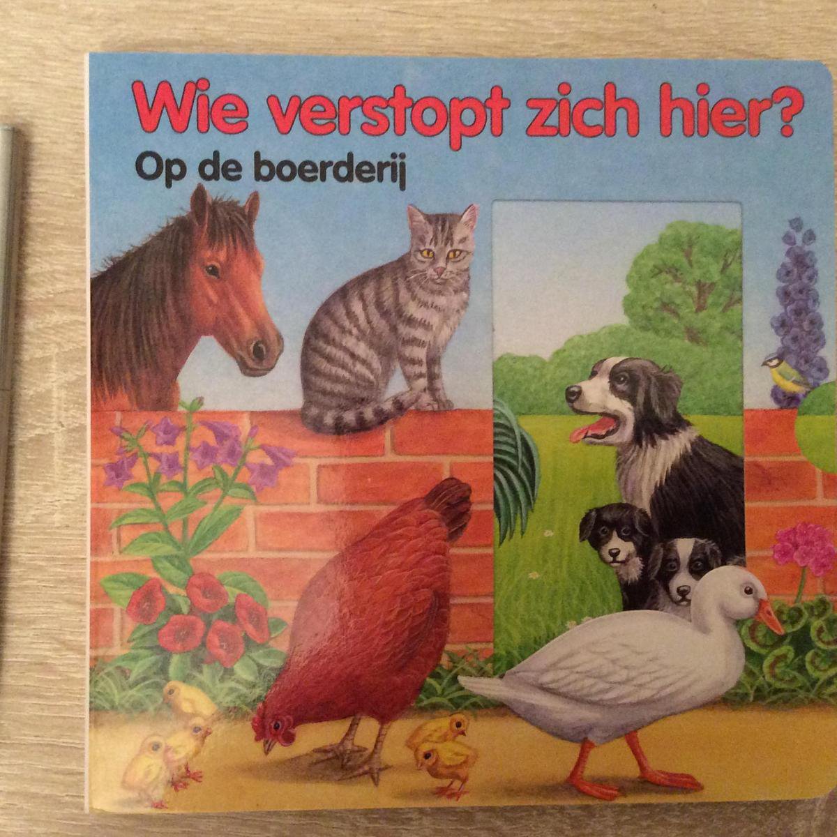 Op de boerderij  Wie verstopt zich hier? (hard kartonnen bladzijdes)