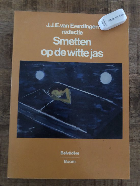 Smetten op de witte jas