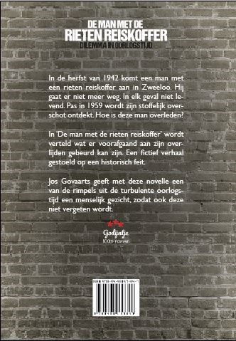 De man met de rieten reiskoffer achterkant