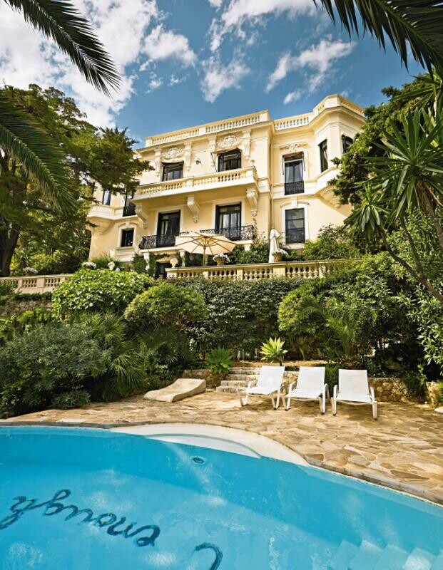 PROMO: Holiday Homes achterkant